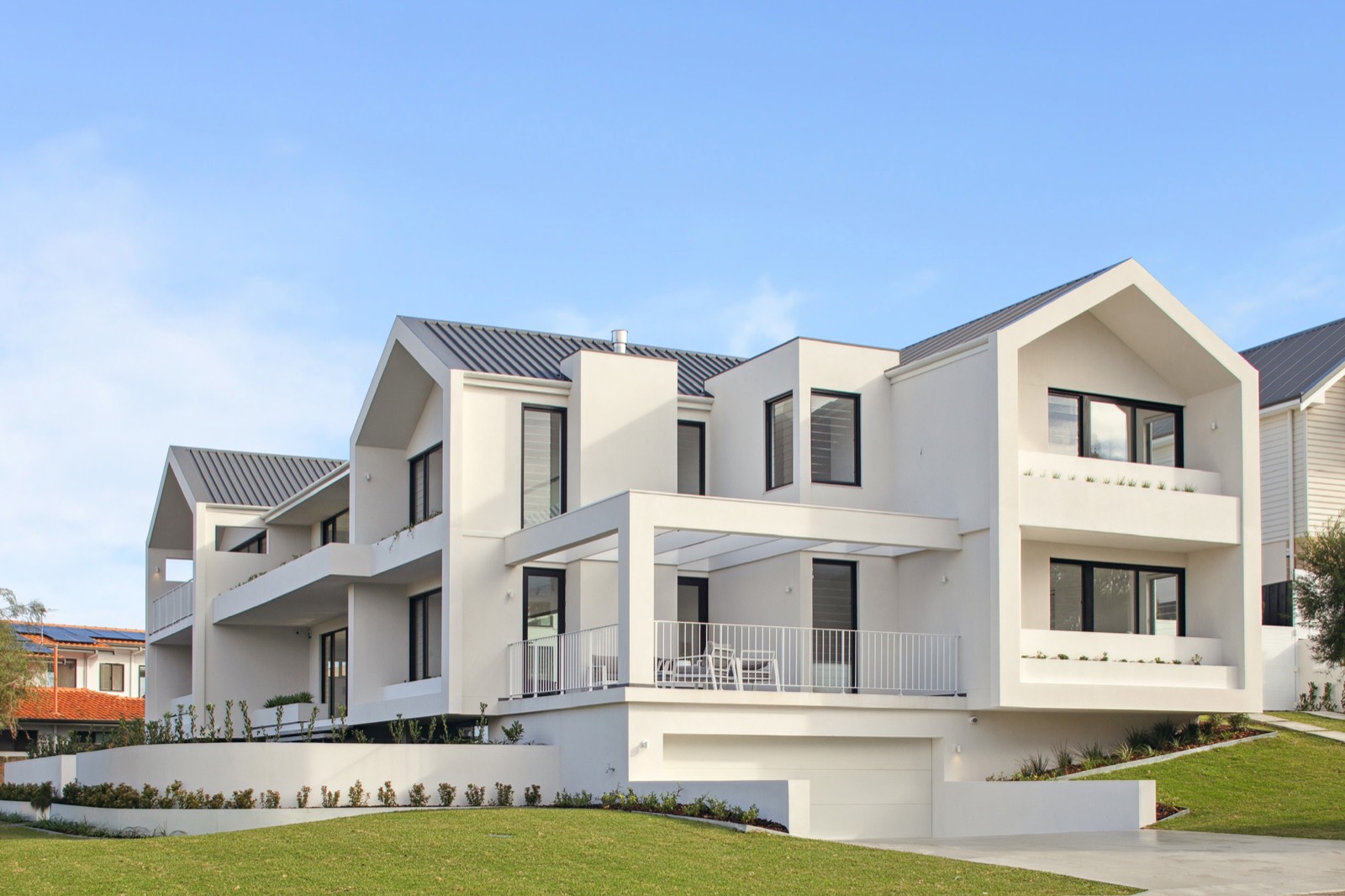 City Beach residence viewed from its landscaped lawn