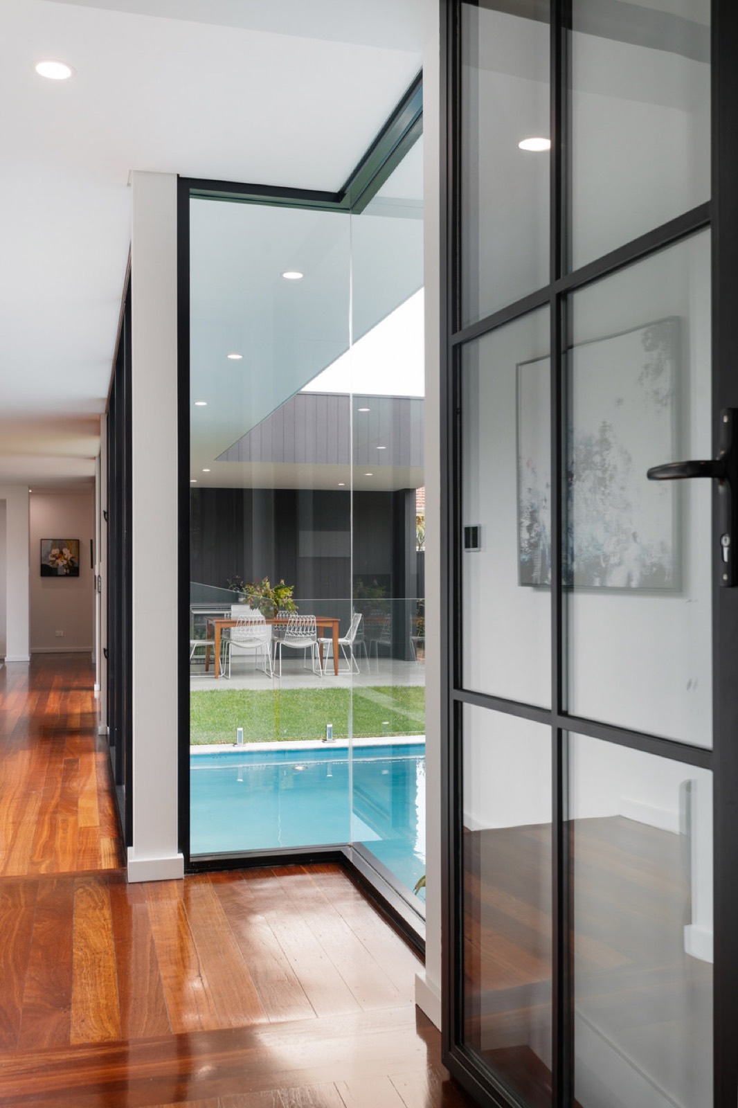Glazed threshold between the original house and new courtyard