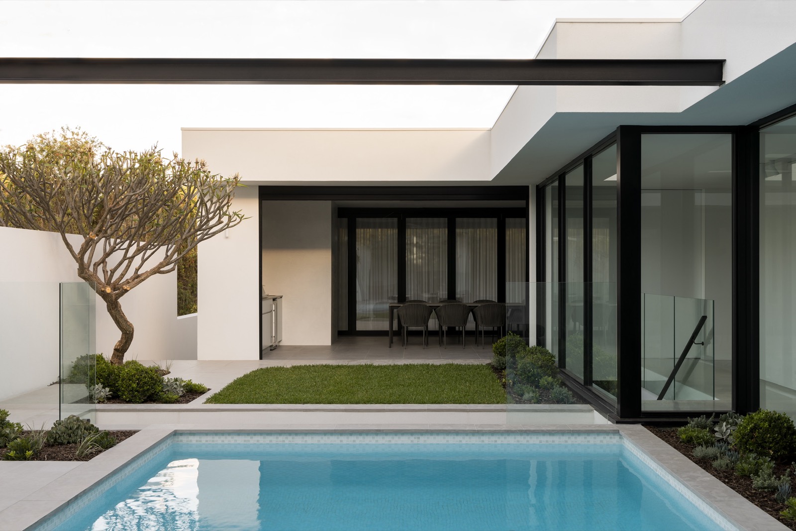 Woodlands project courtyard, pool and outdoor living spaces