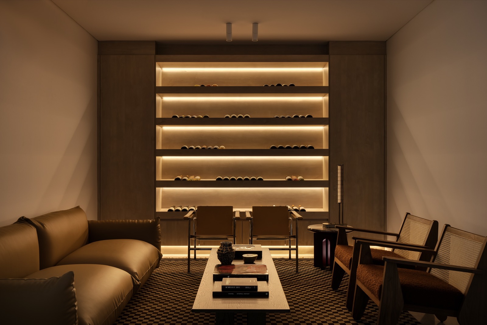 Warmly lit wine room and lounge